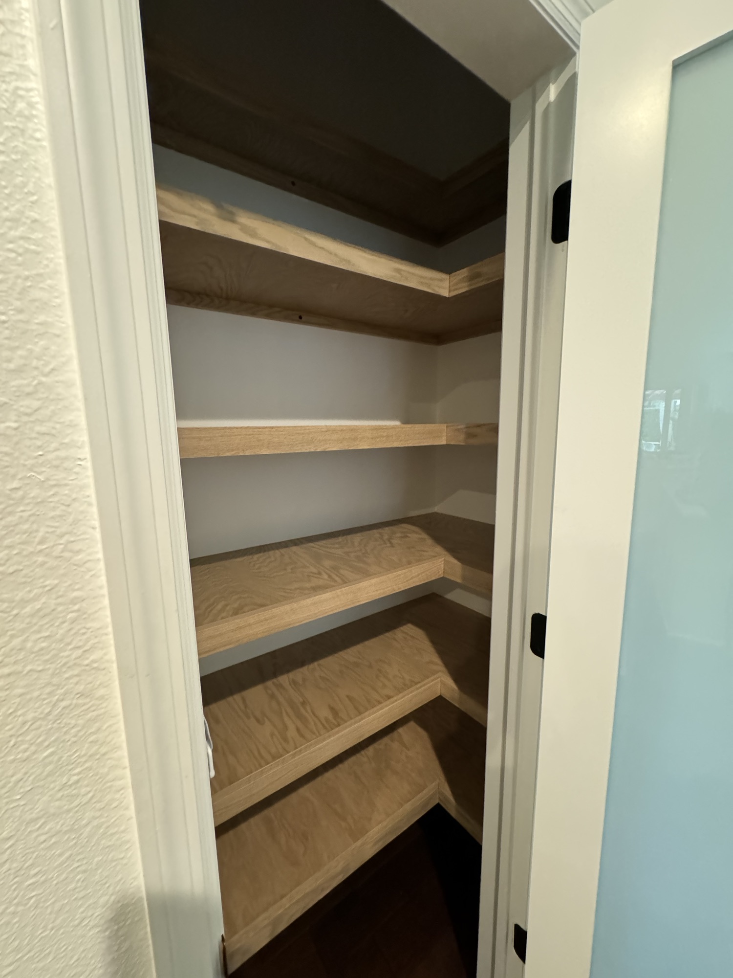 Stained pantry shelves